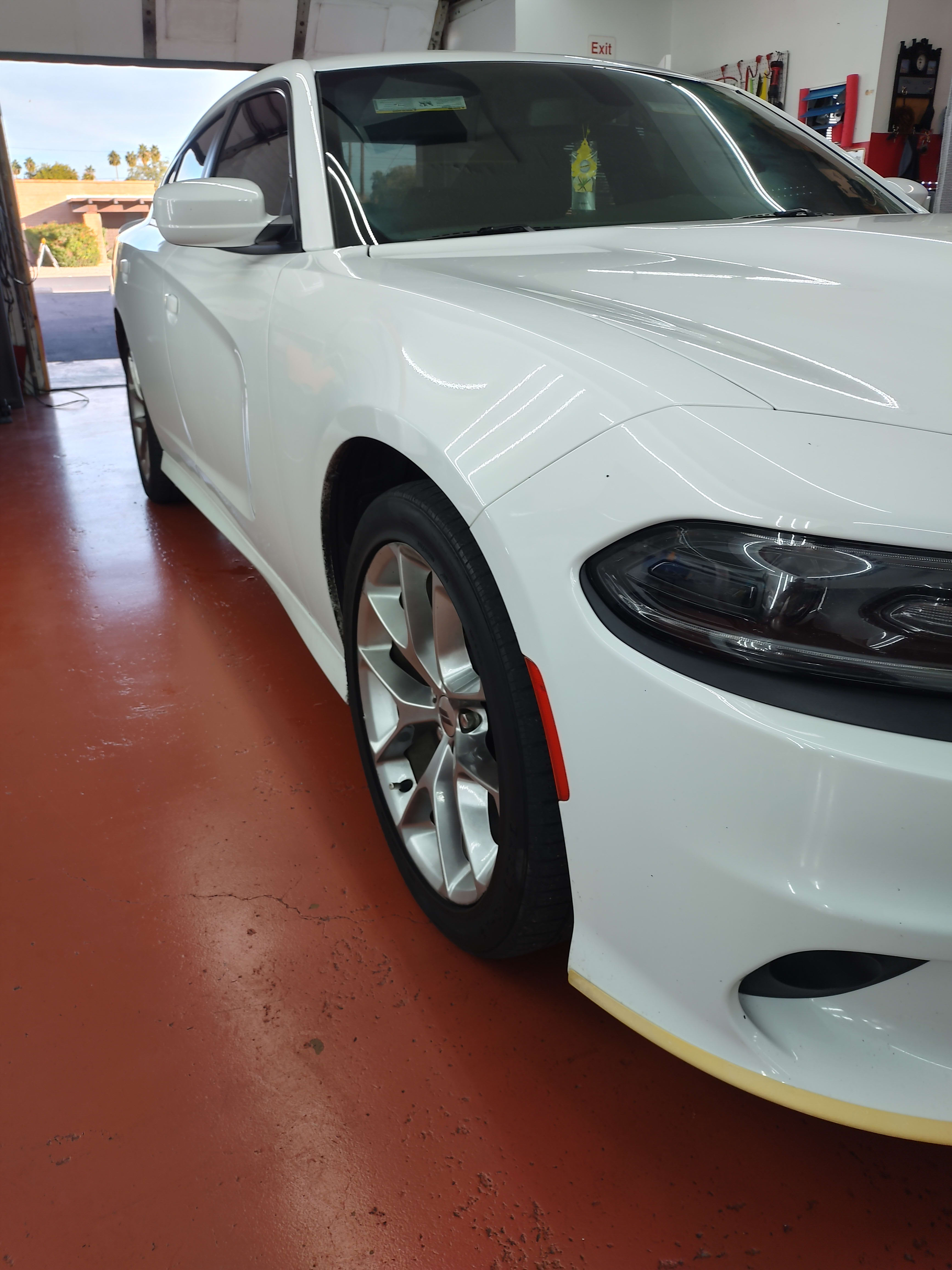 White Dodge Charger, front three-quarter