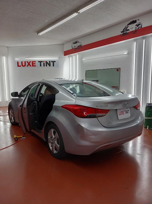 Silver Hyundai Elantra, rear three-quarter