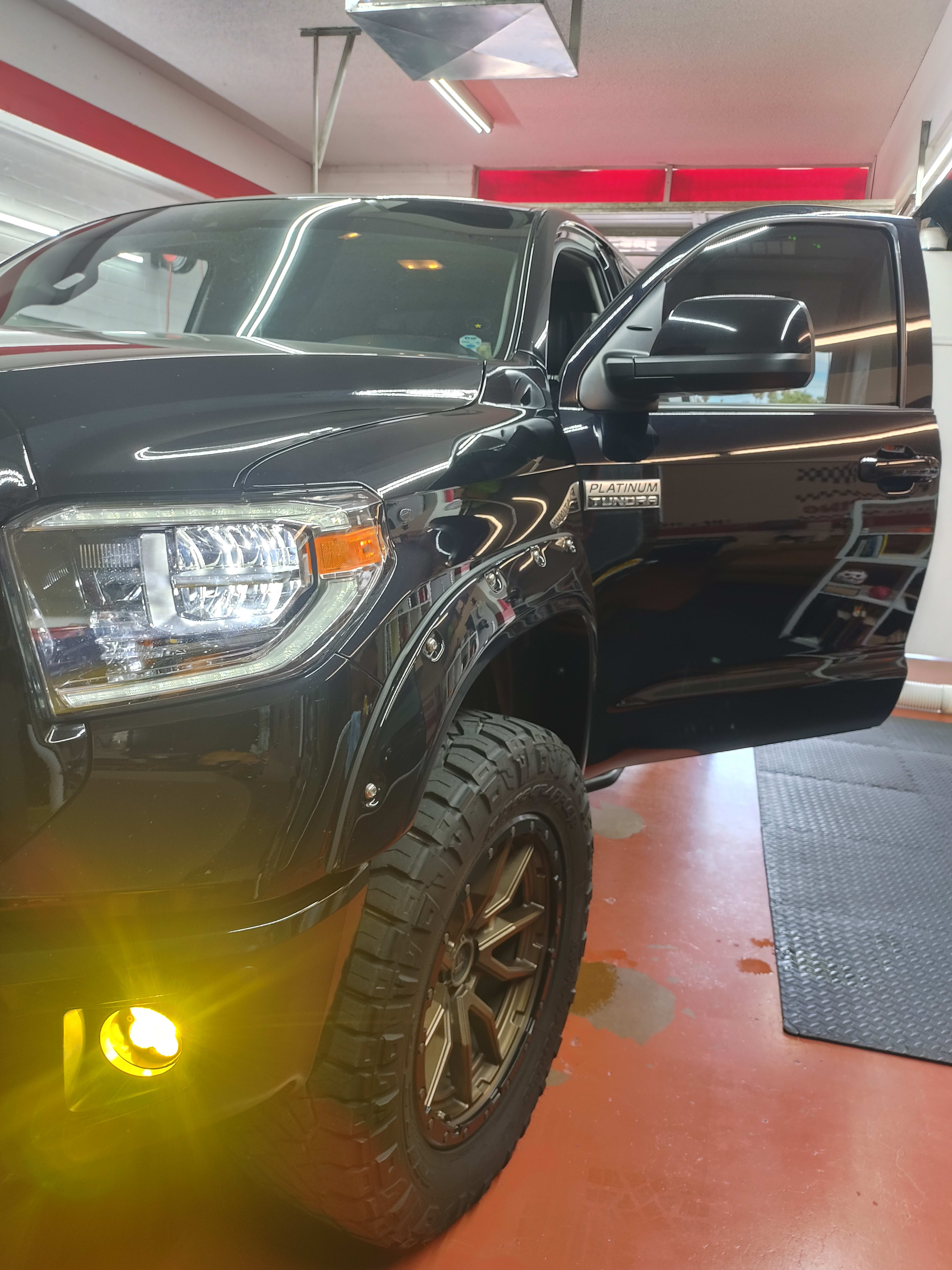 Black Toyota Tundra, front three-quarter