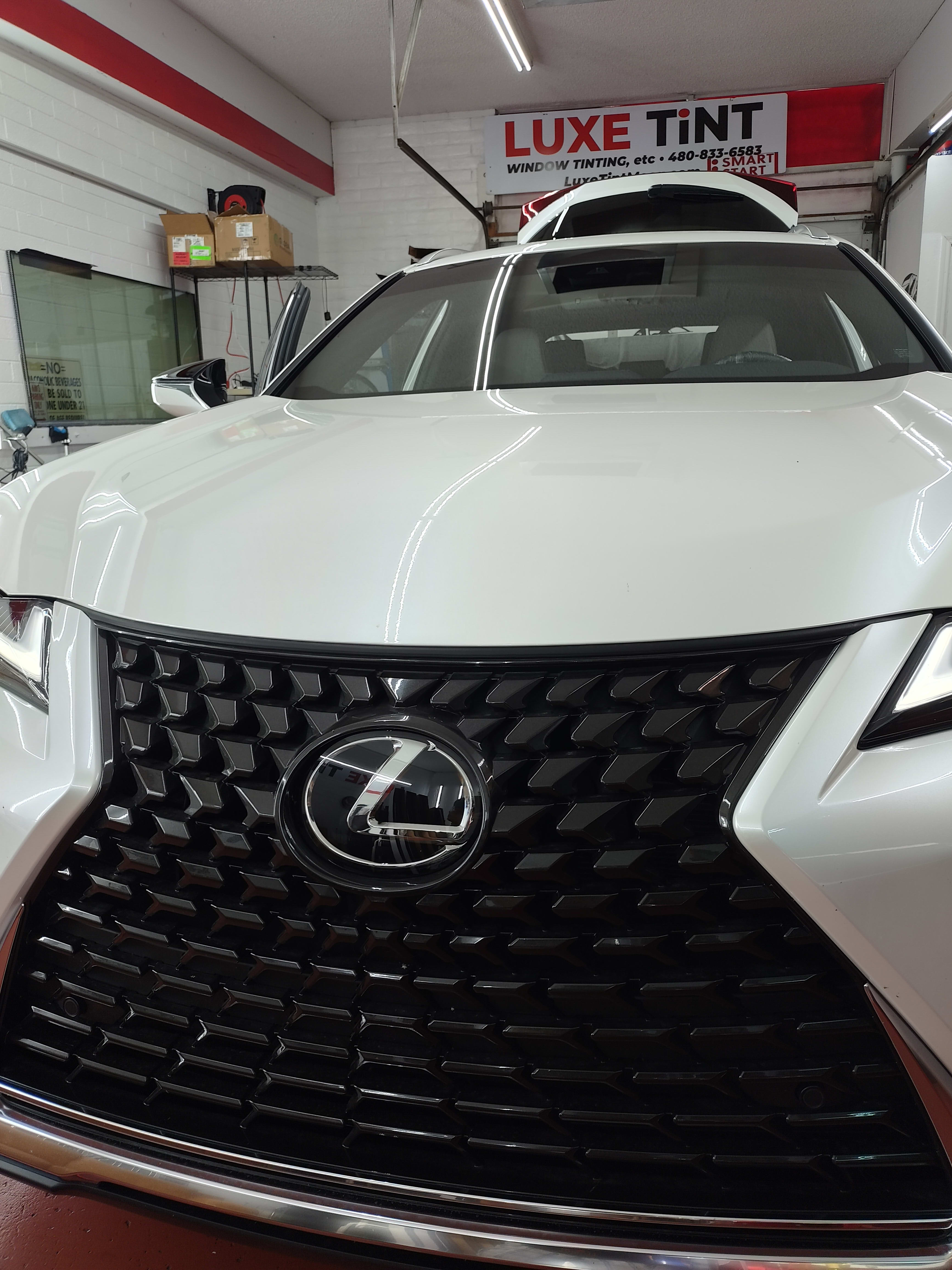 White Lexus NX, front grille