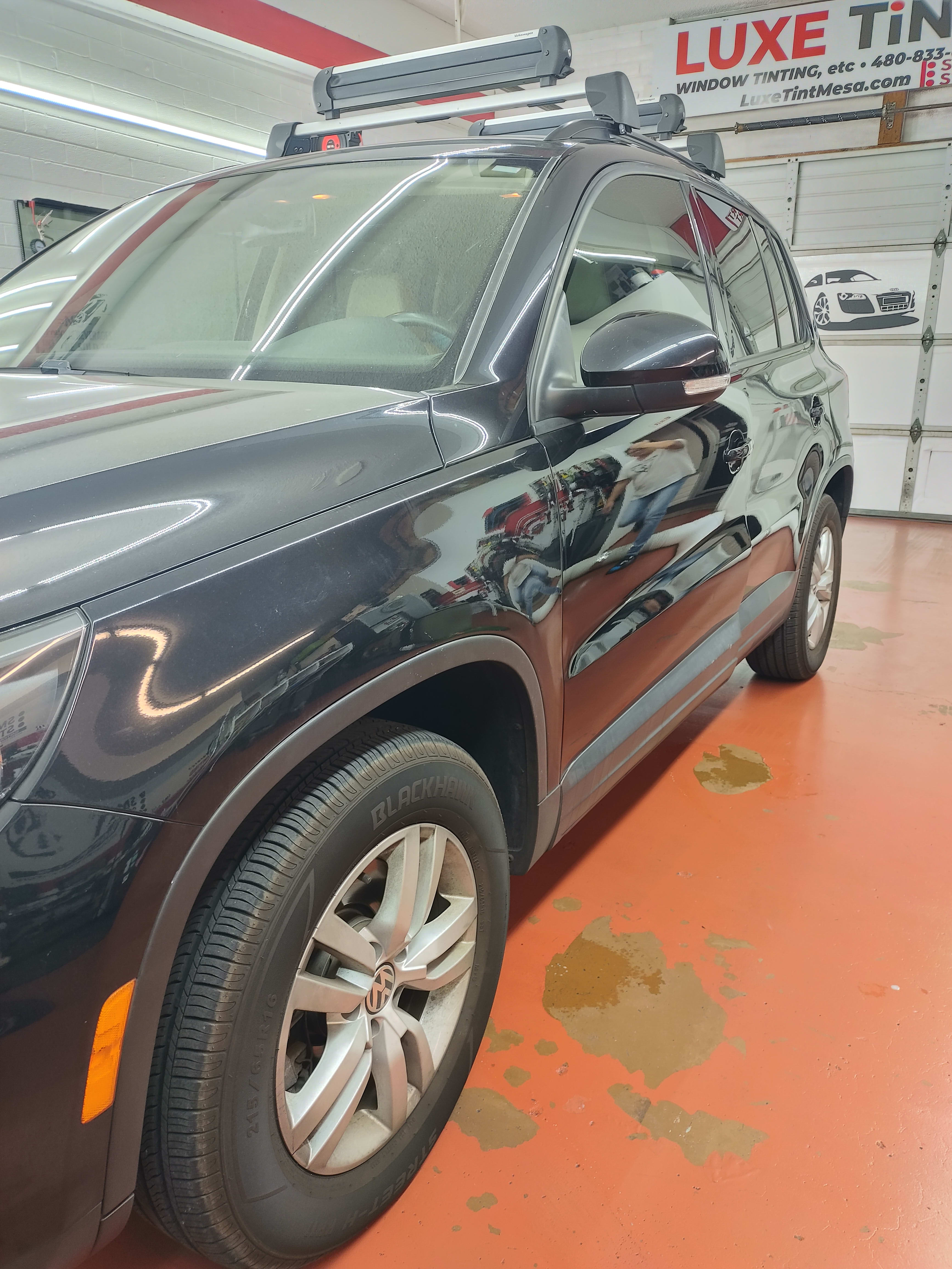 Black VW Tiguan, front three-quarter
