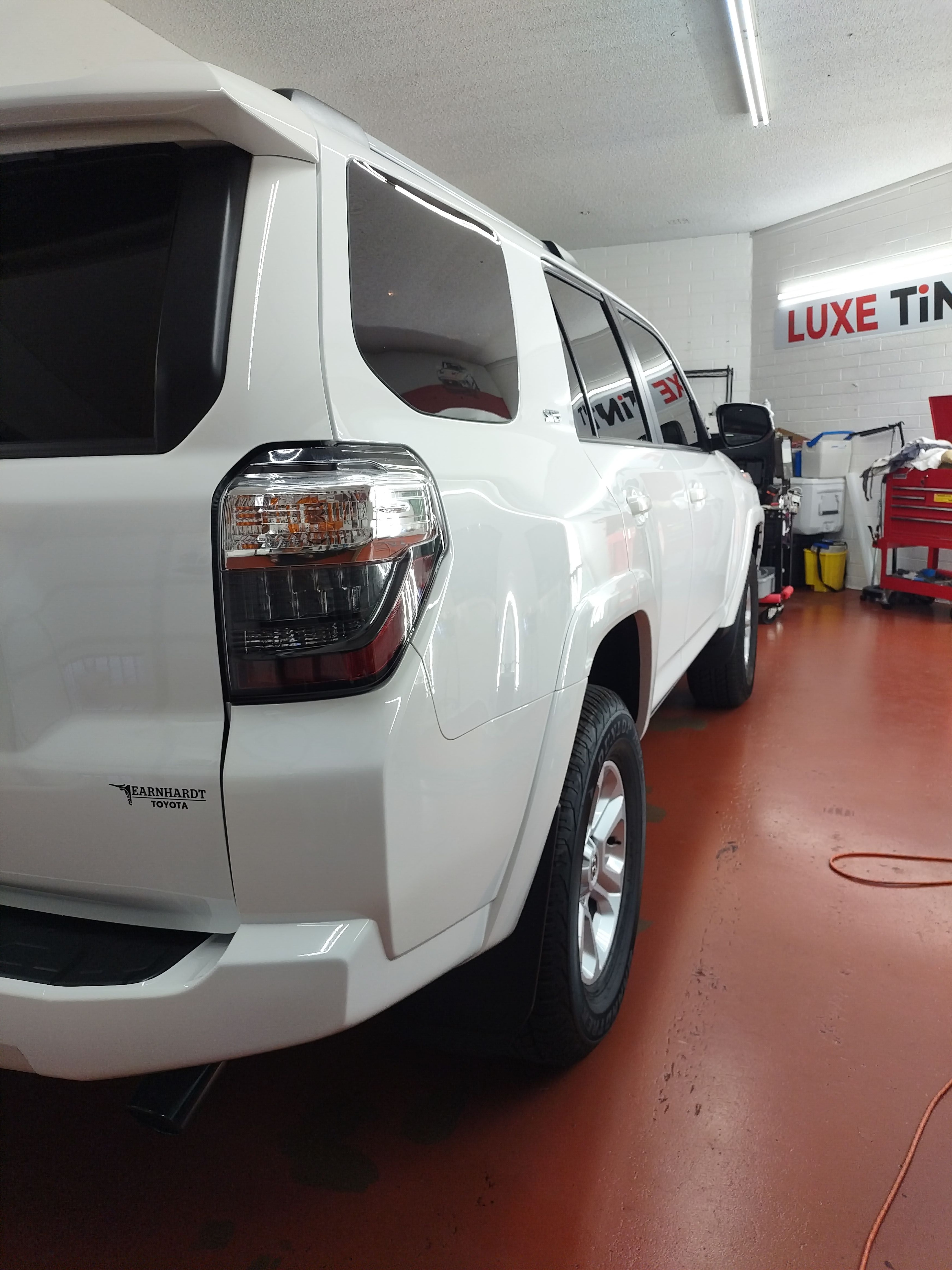 White Toyota 4Runner, rear three-quarter