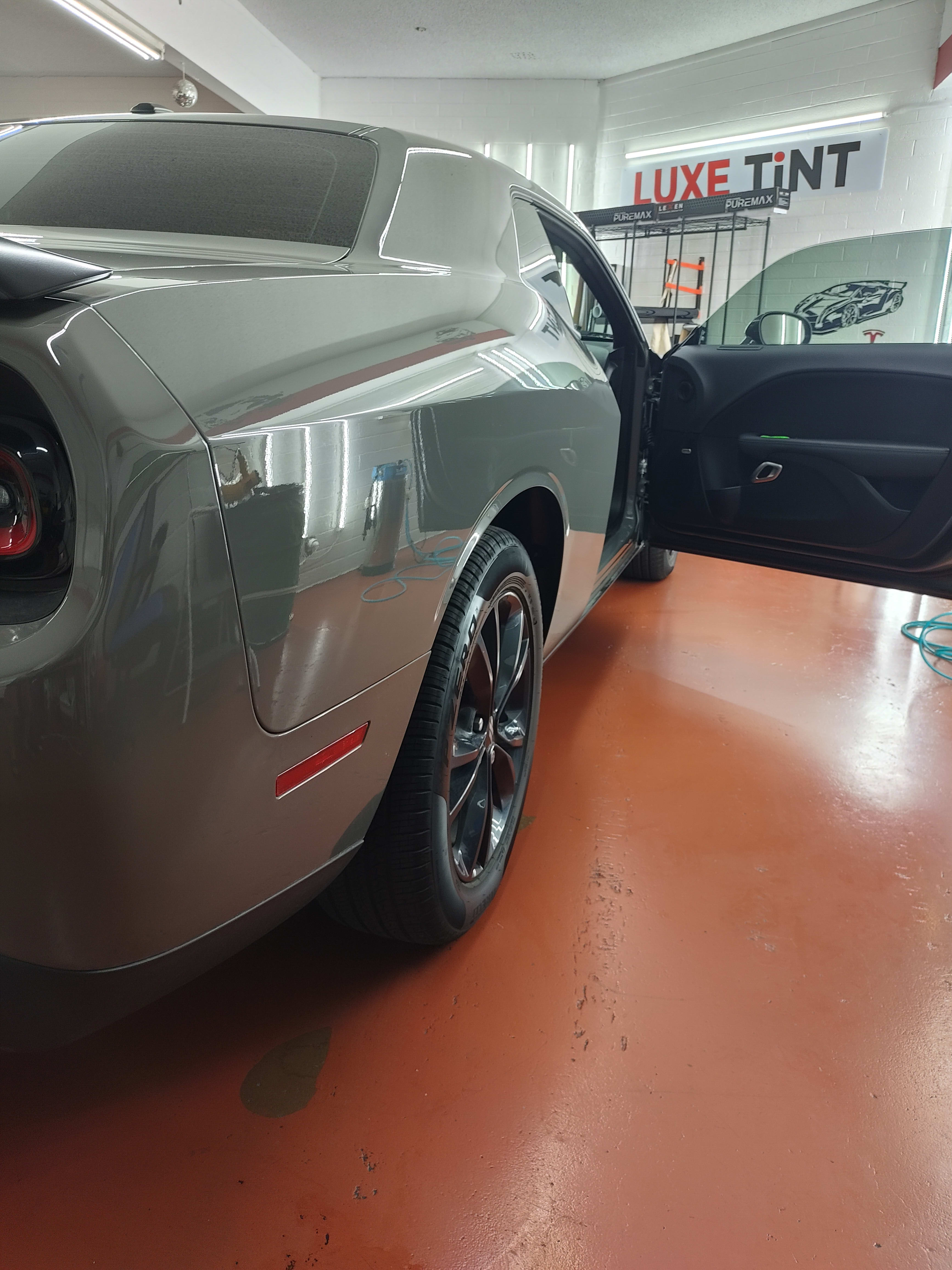Gray Dodge Challenger, rear three-quarter