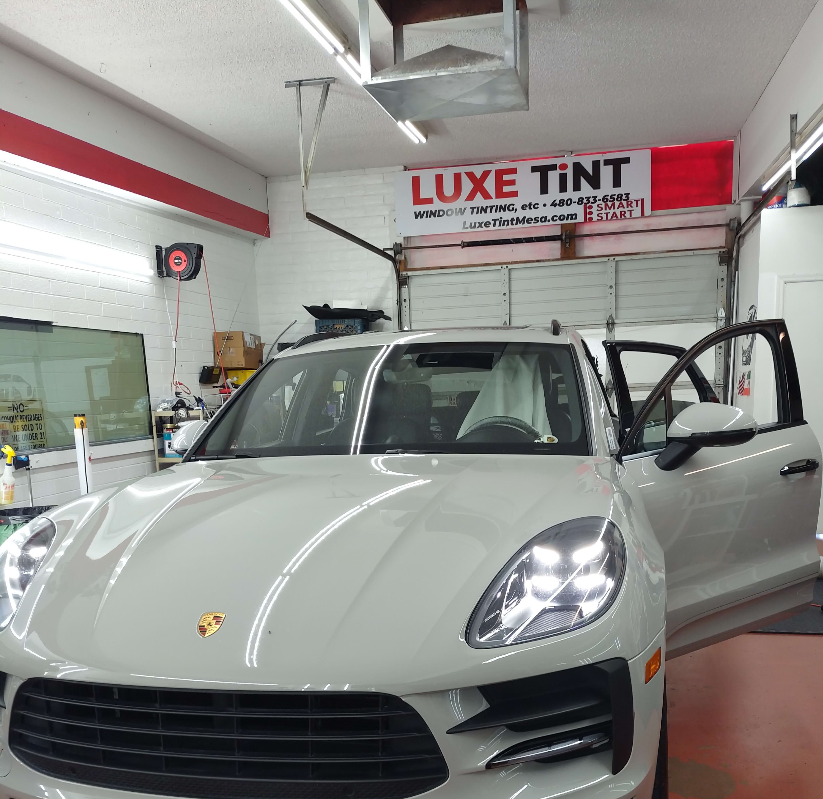 Porsche Macan in the Luxe Tint bay