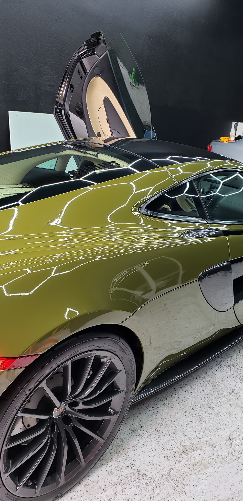 McLaren 570S, door up, fresh ceramic tint