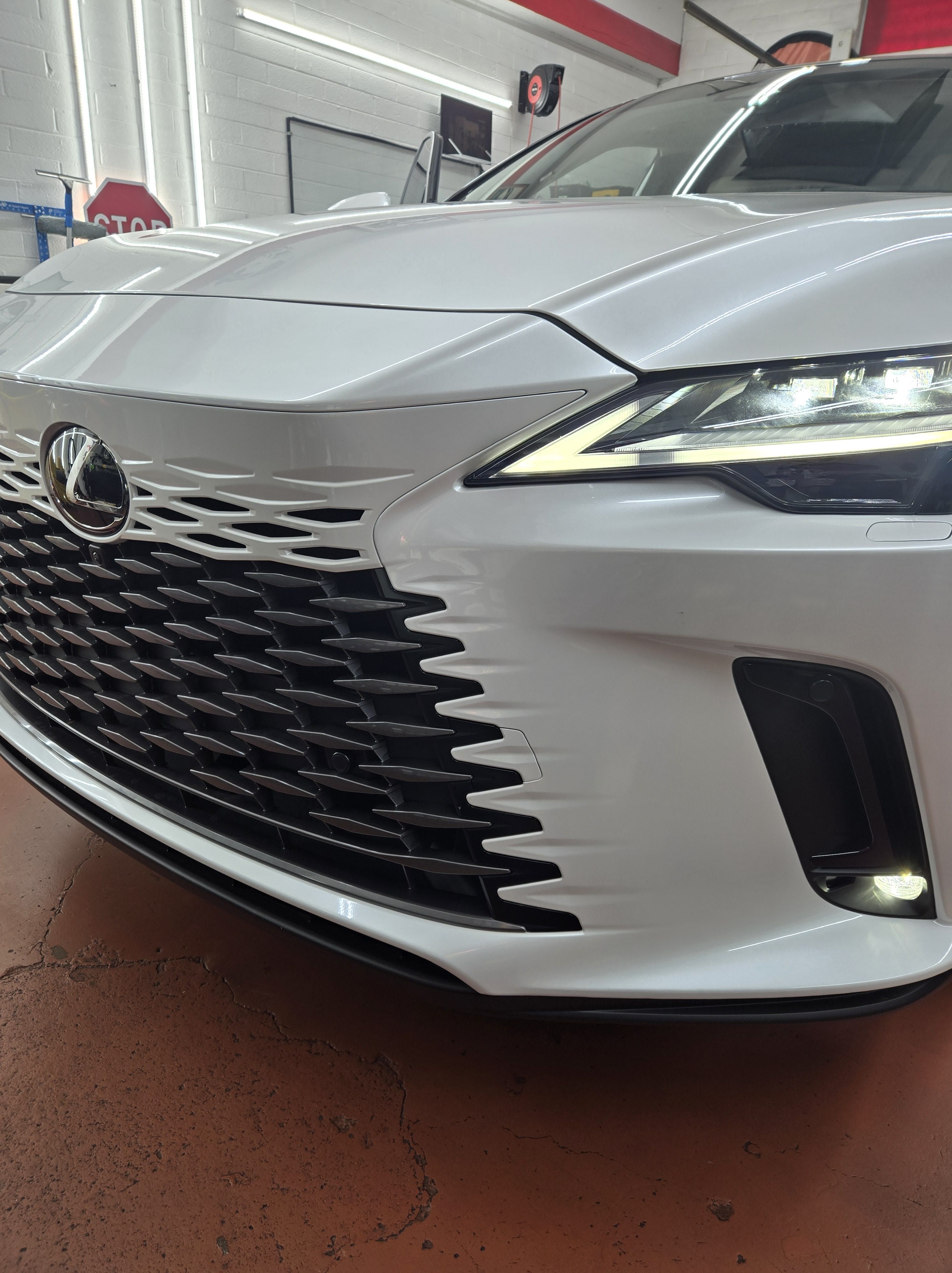 White Lexus RX, front