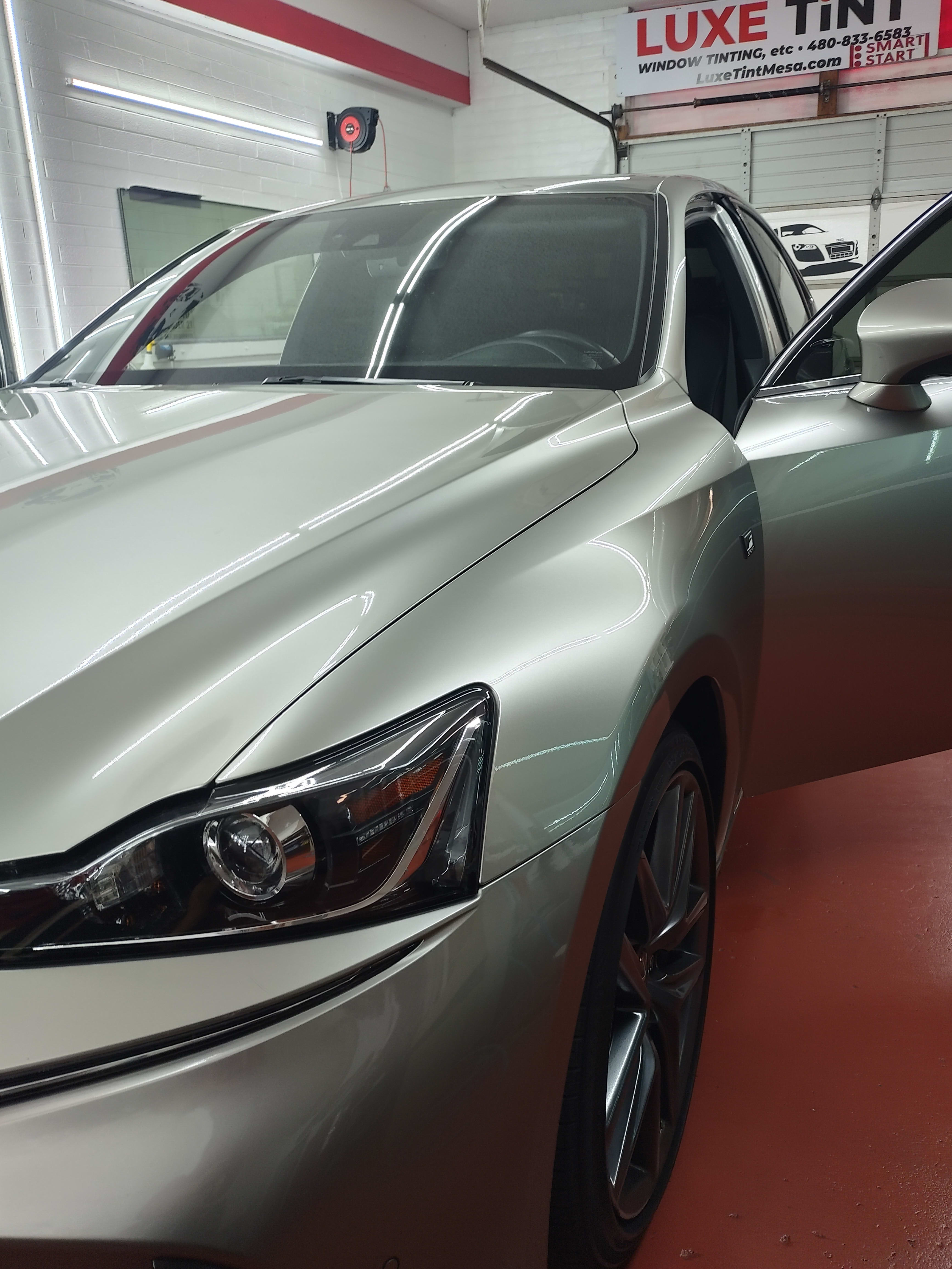 Silver Lexus IS 300, front three-quarter