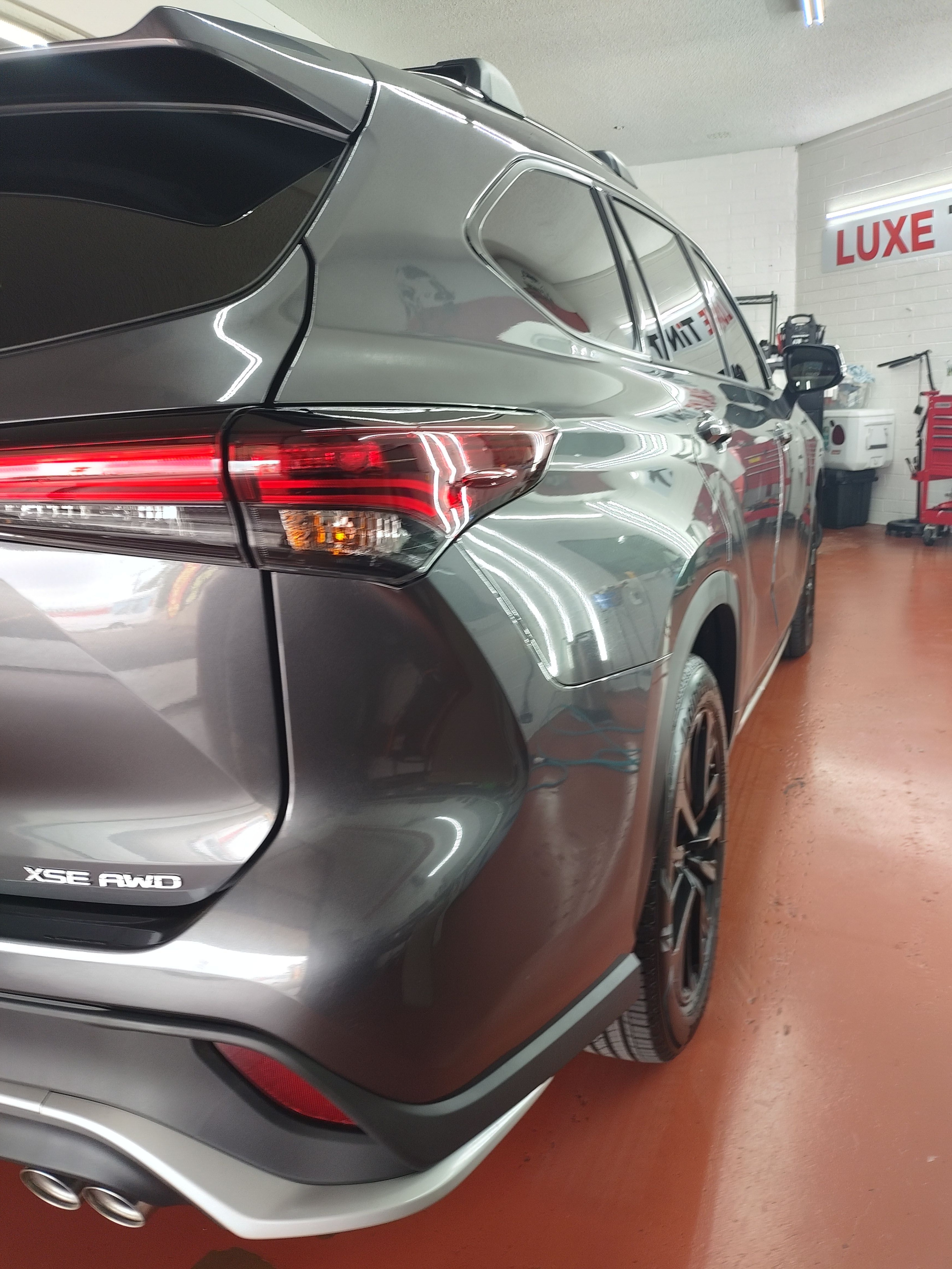Grey Toyota Camry XSE AWD, rear
