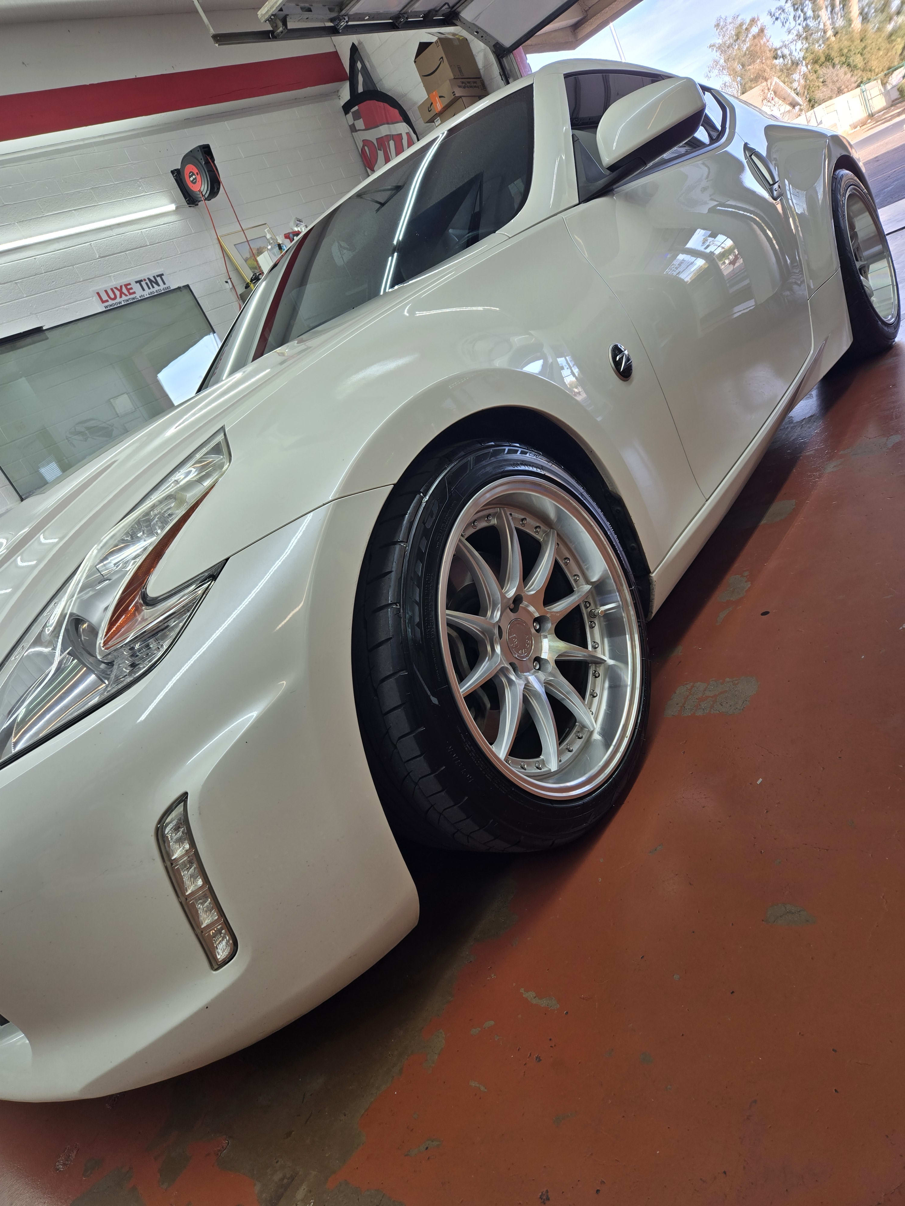 White Nissan 370Z, front three-quarter
