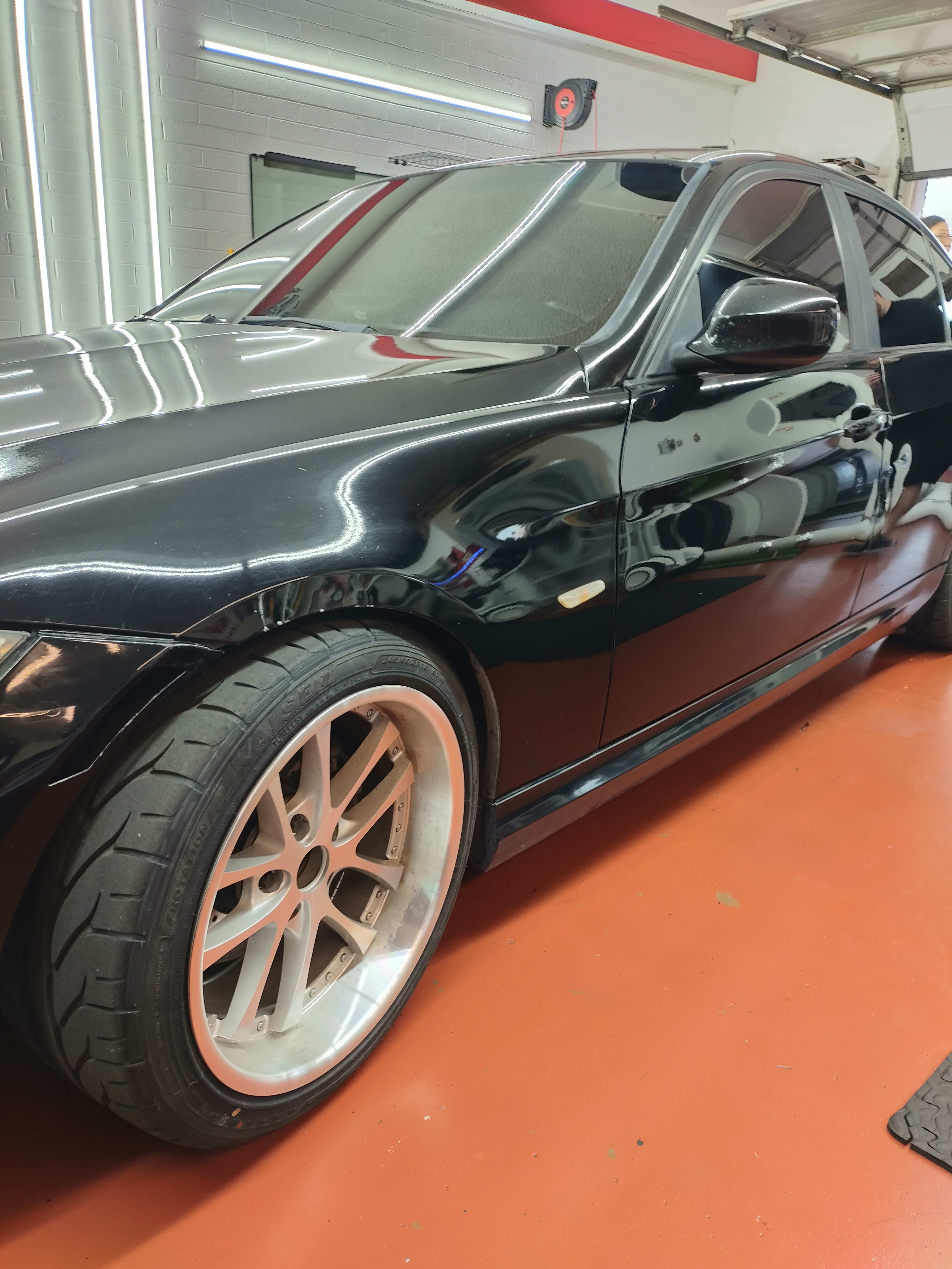 Black BMW 3 Series, side