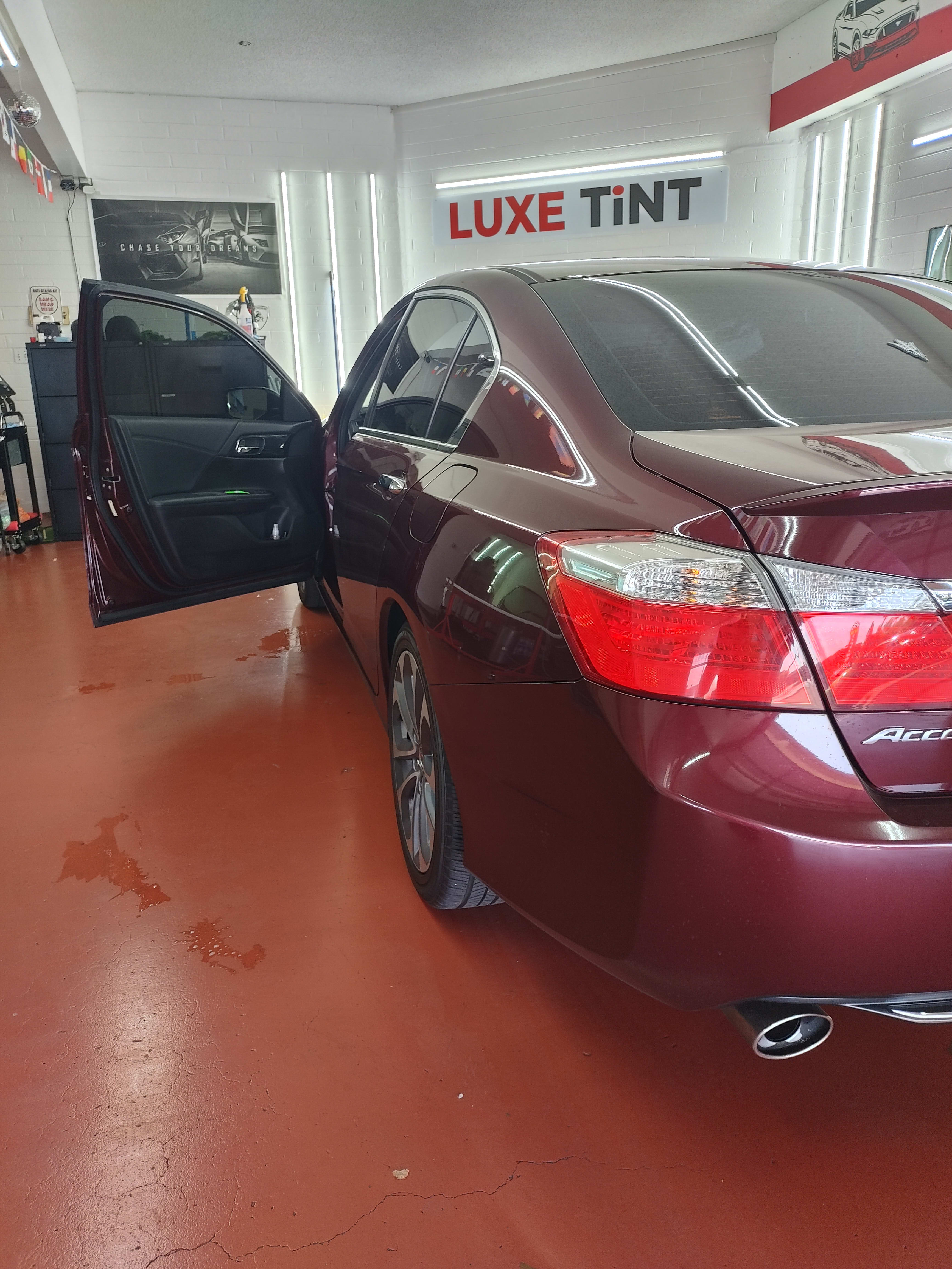 Burgundy Honda Accord, rear three-quarter