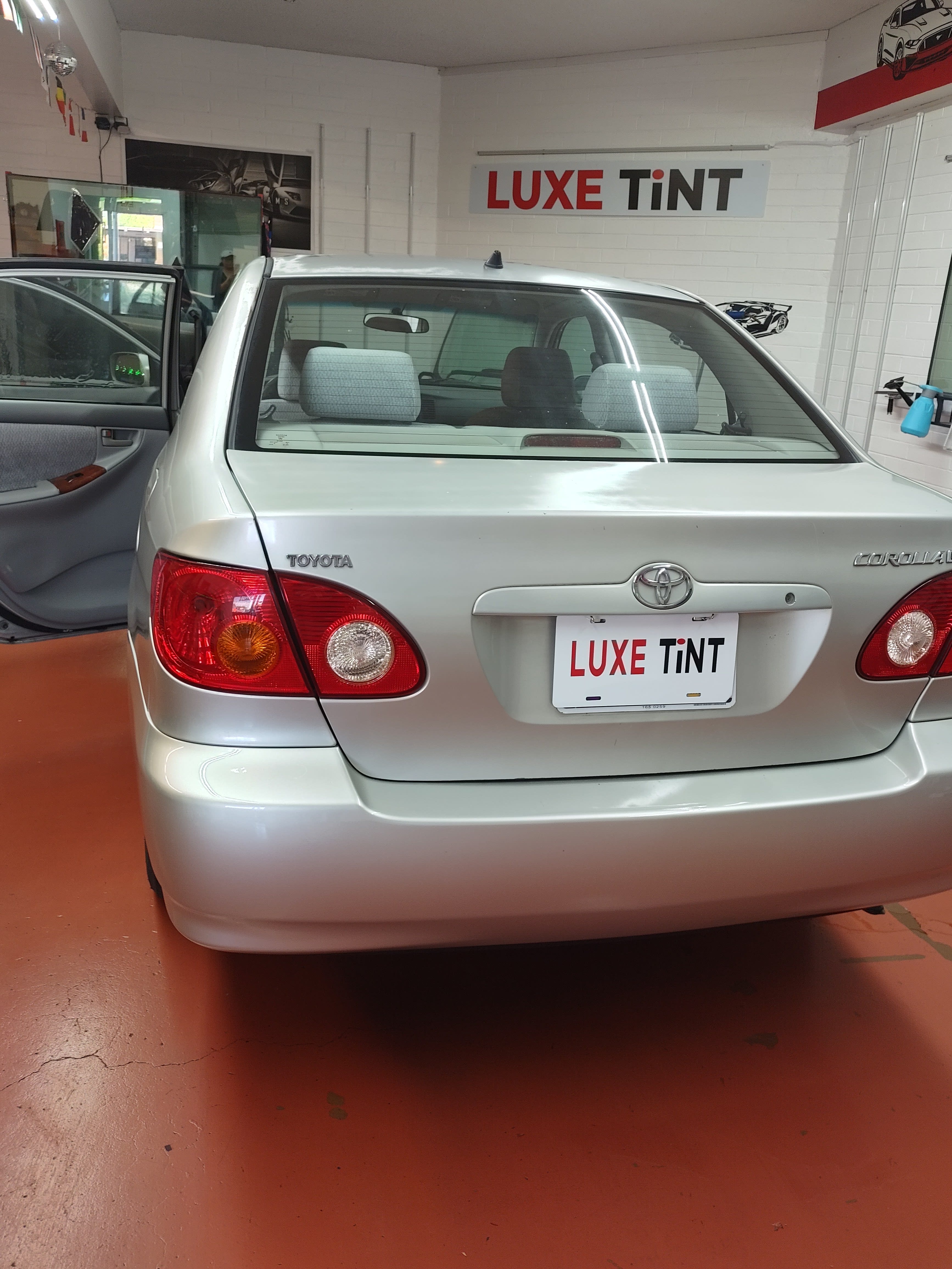 Silver Toyota Corolla, rear