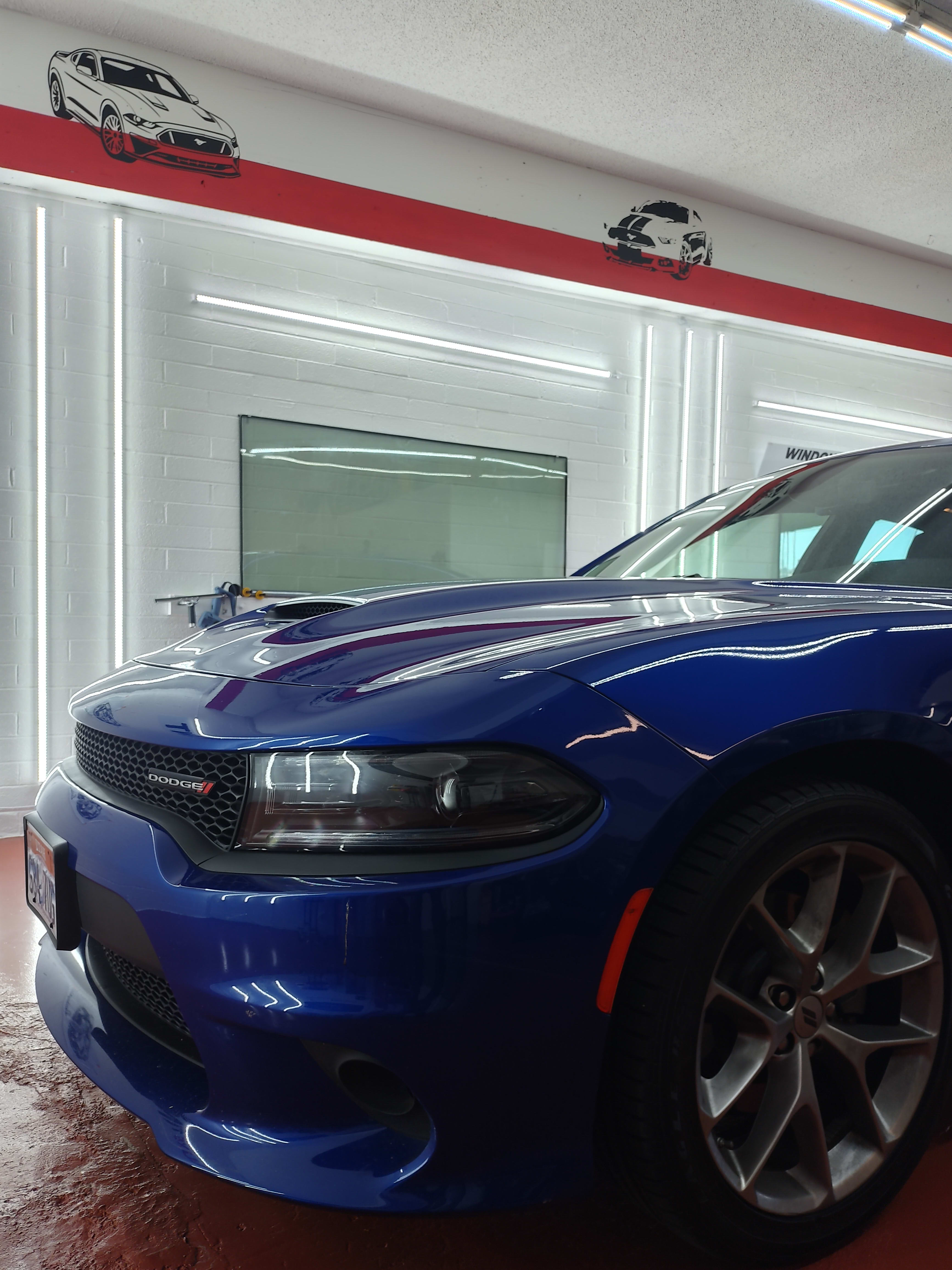 Blue Dodge Charger, front three-quarter