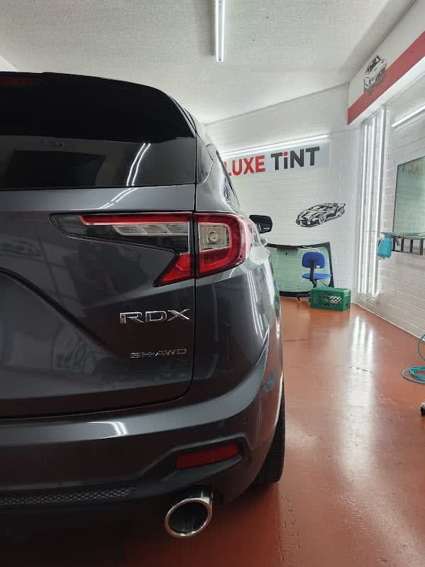 Grey Acura RDX, rear three-quarter