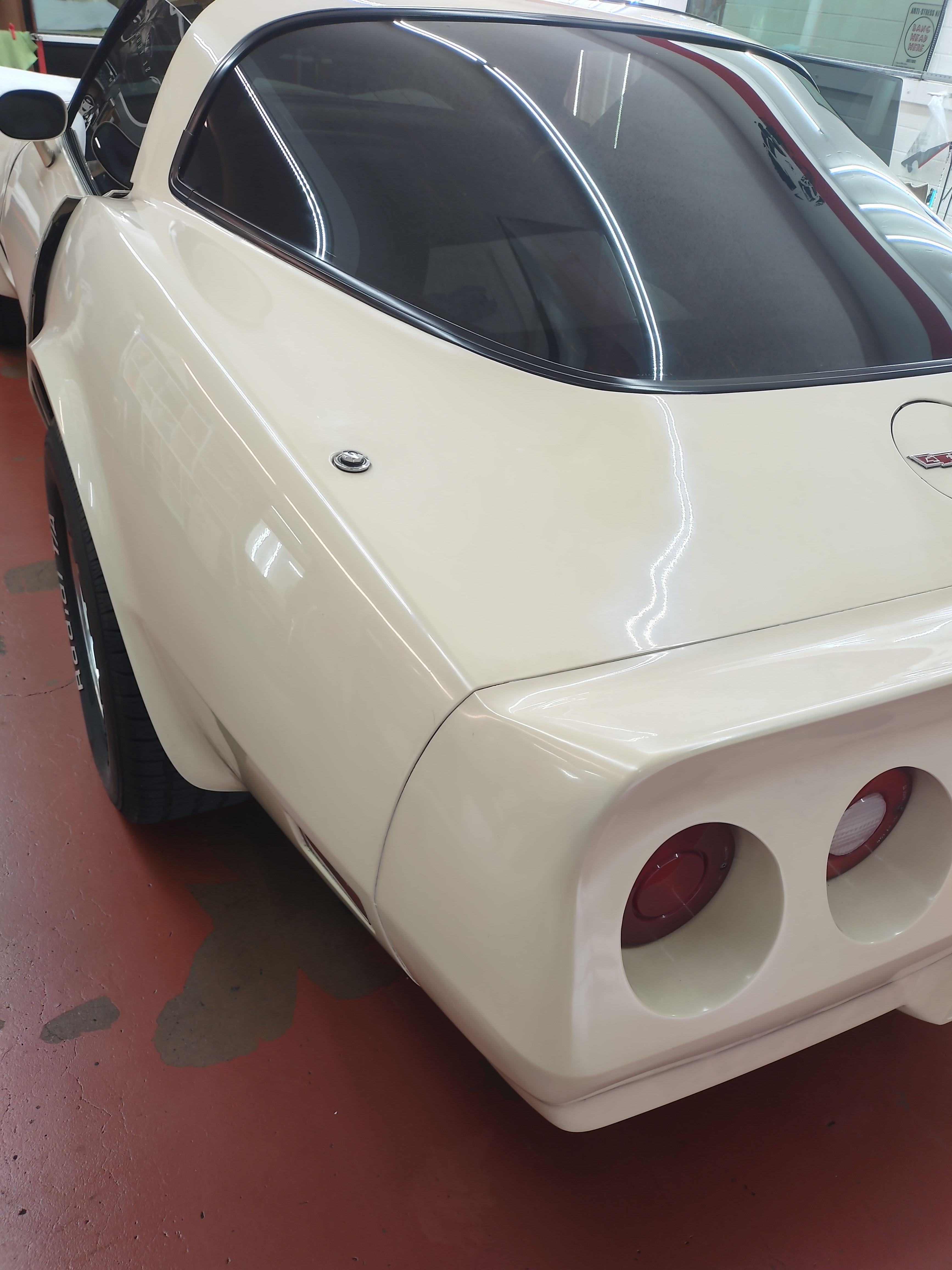 Cream 1980 Chevy Corvette, rear glass