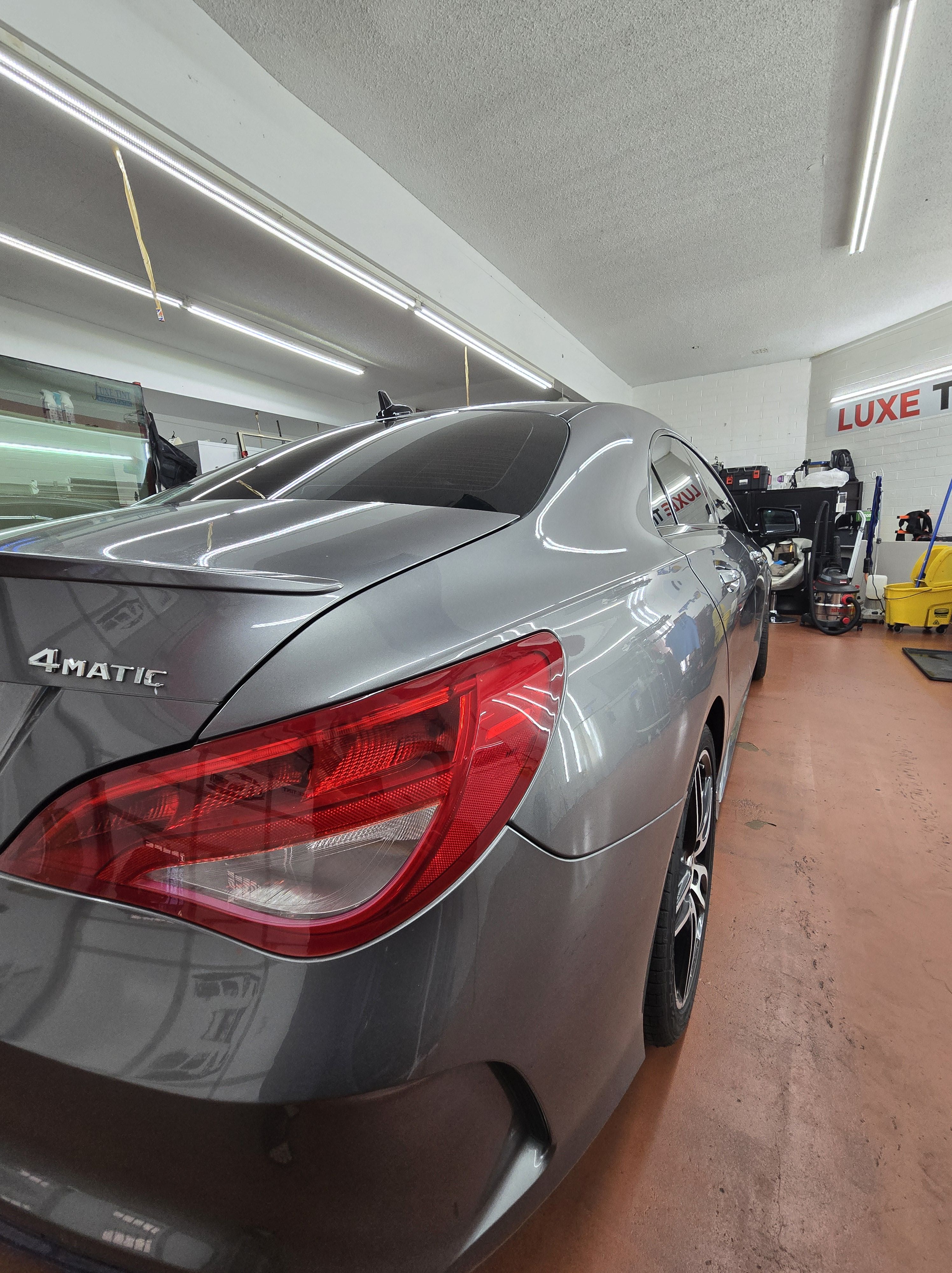 Grey Mercedes CLA, rear three-quarter