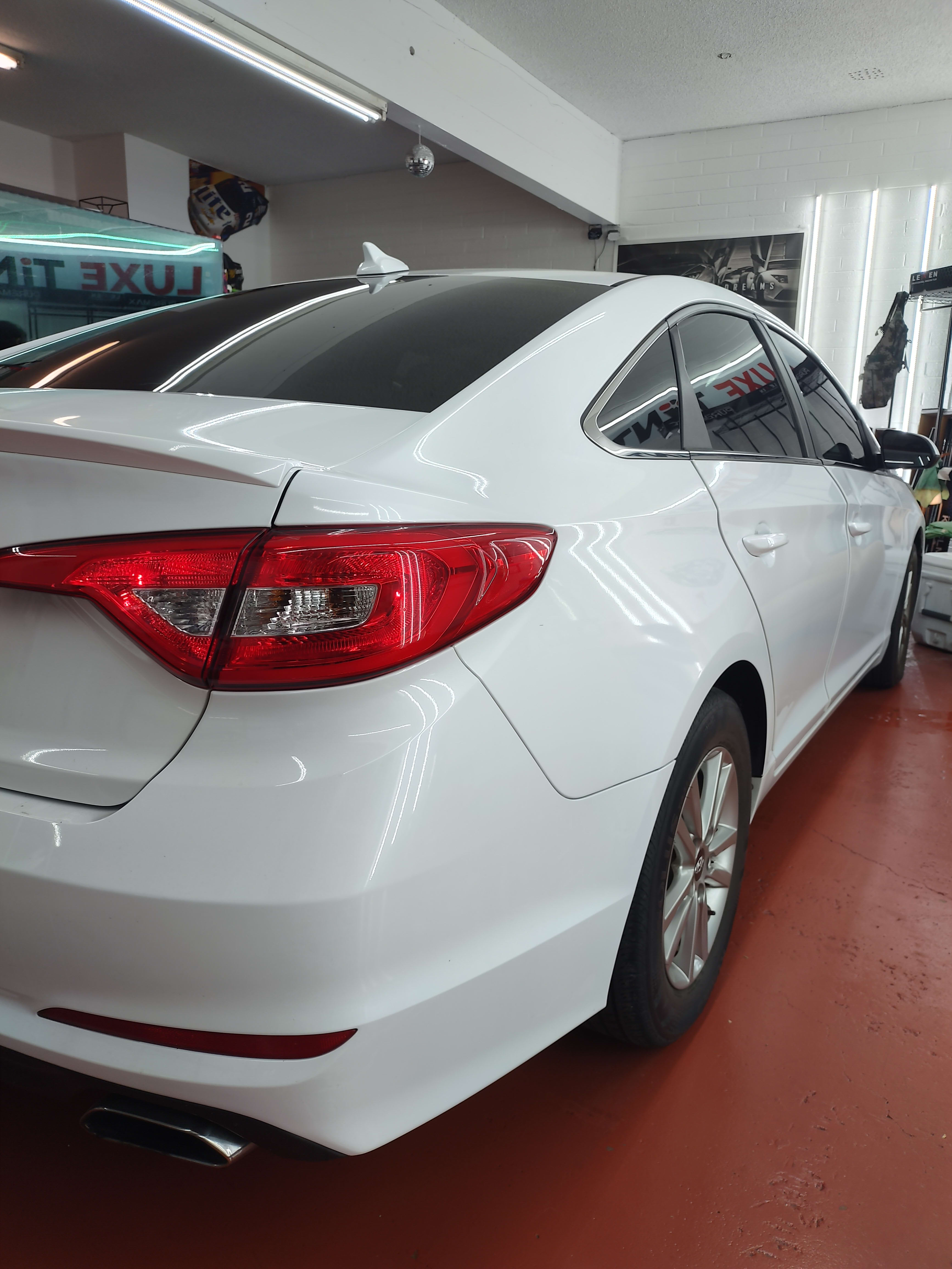 White Hyundai Sonata, rear three-quarter