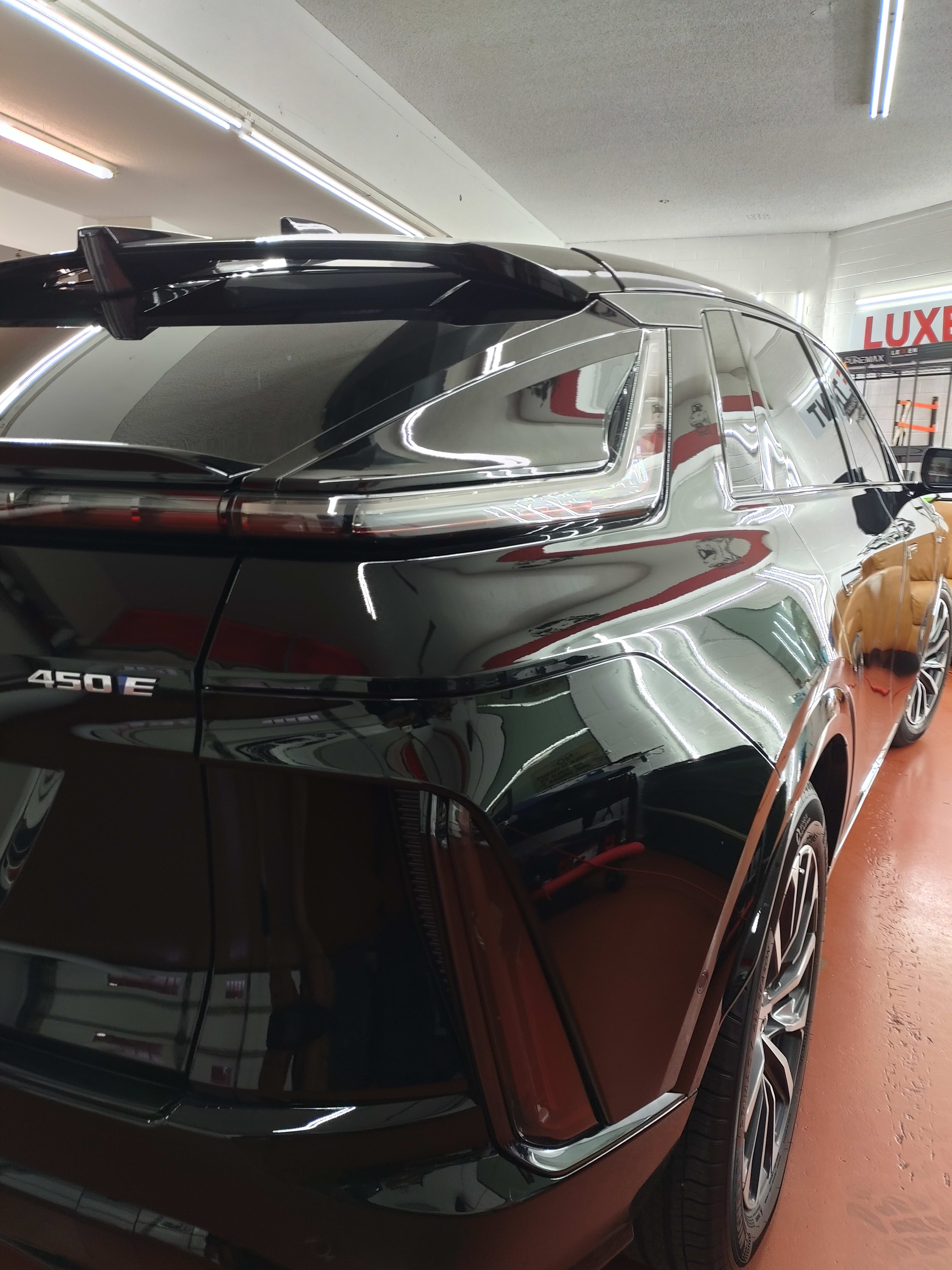 Black Cadillac Lyriq, rear three-quarter