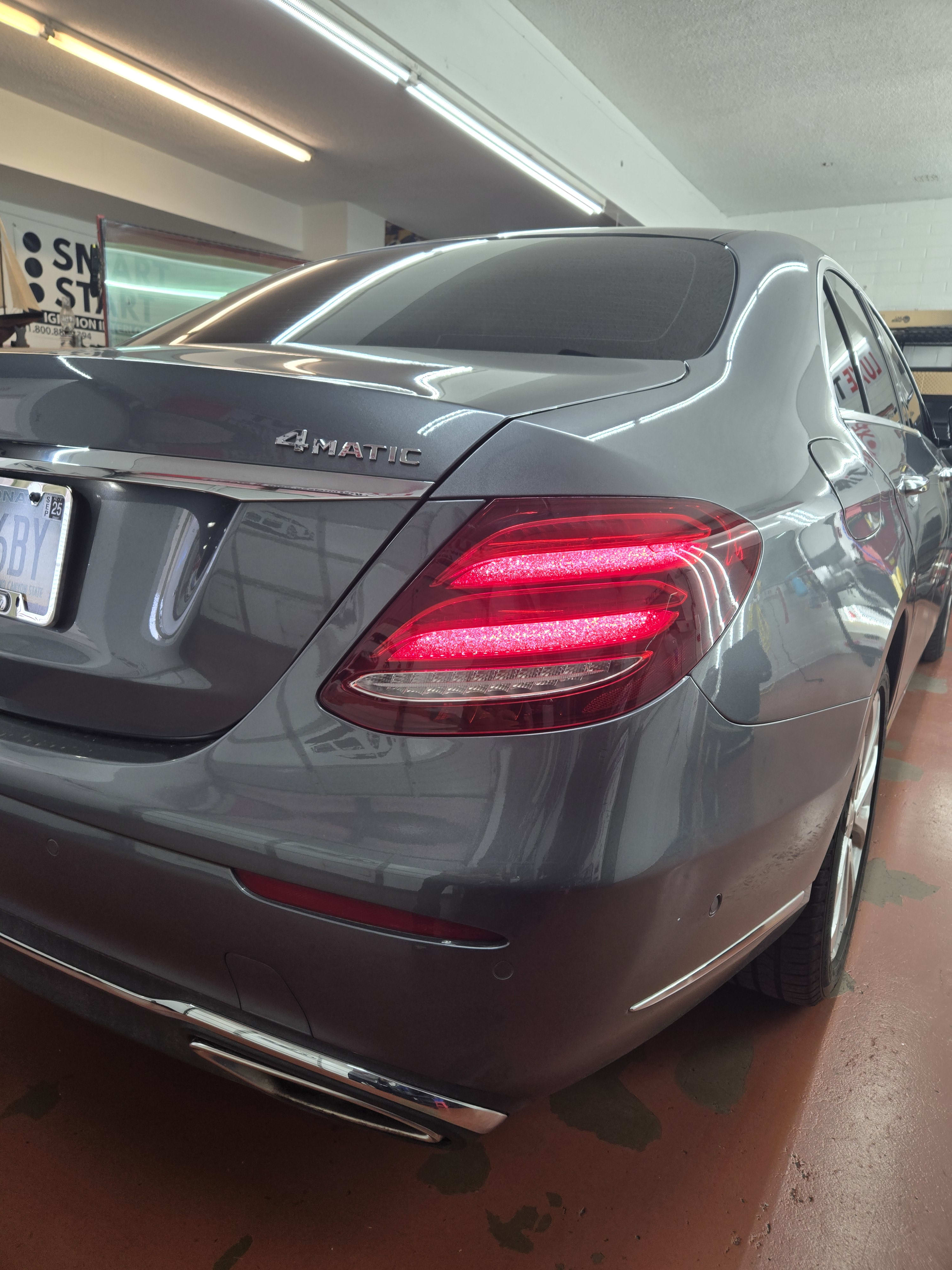 Grey Mercedes E-Class, rear