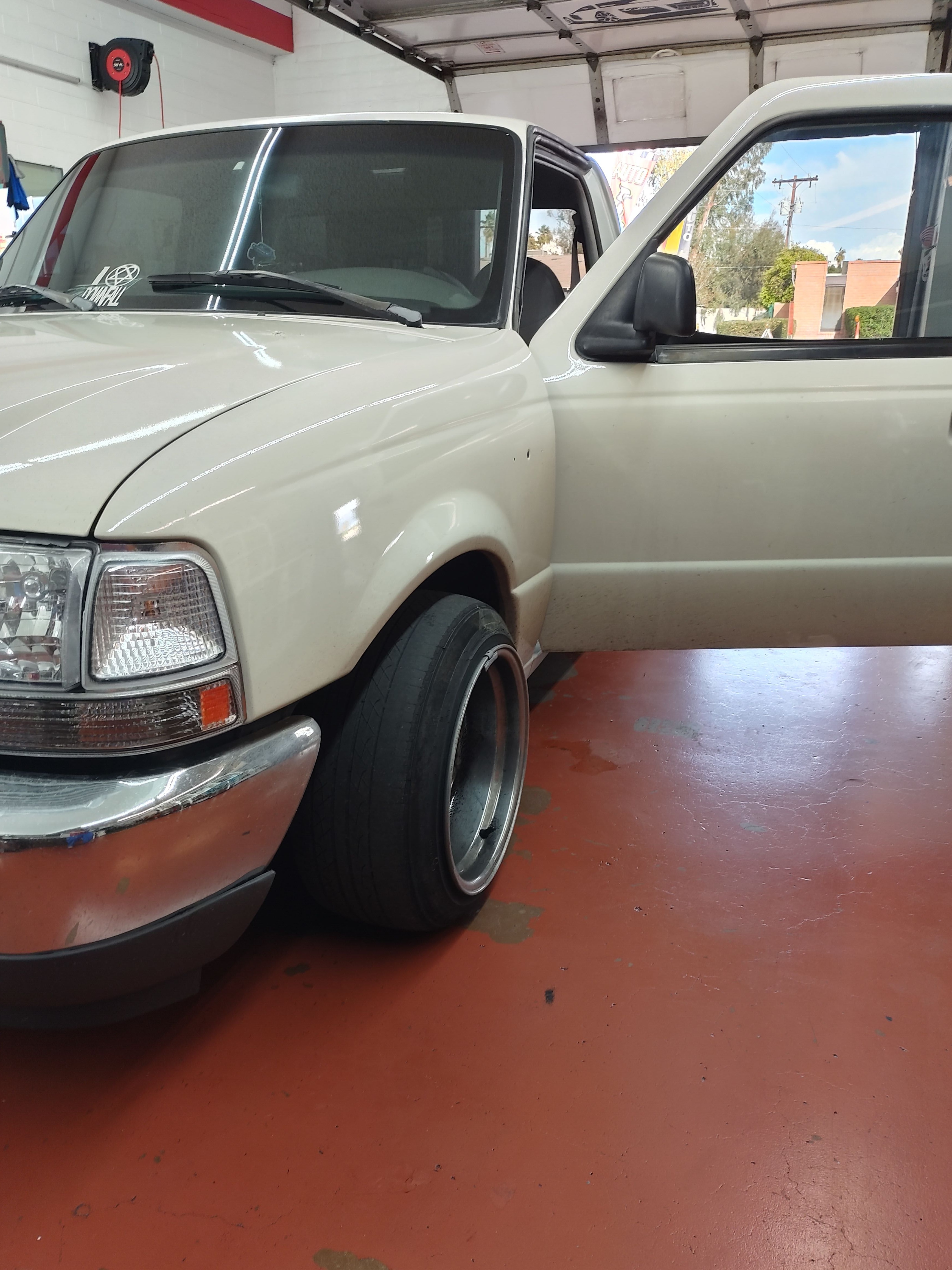 White pickup truck, front door