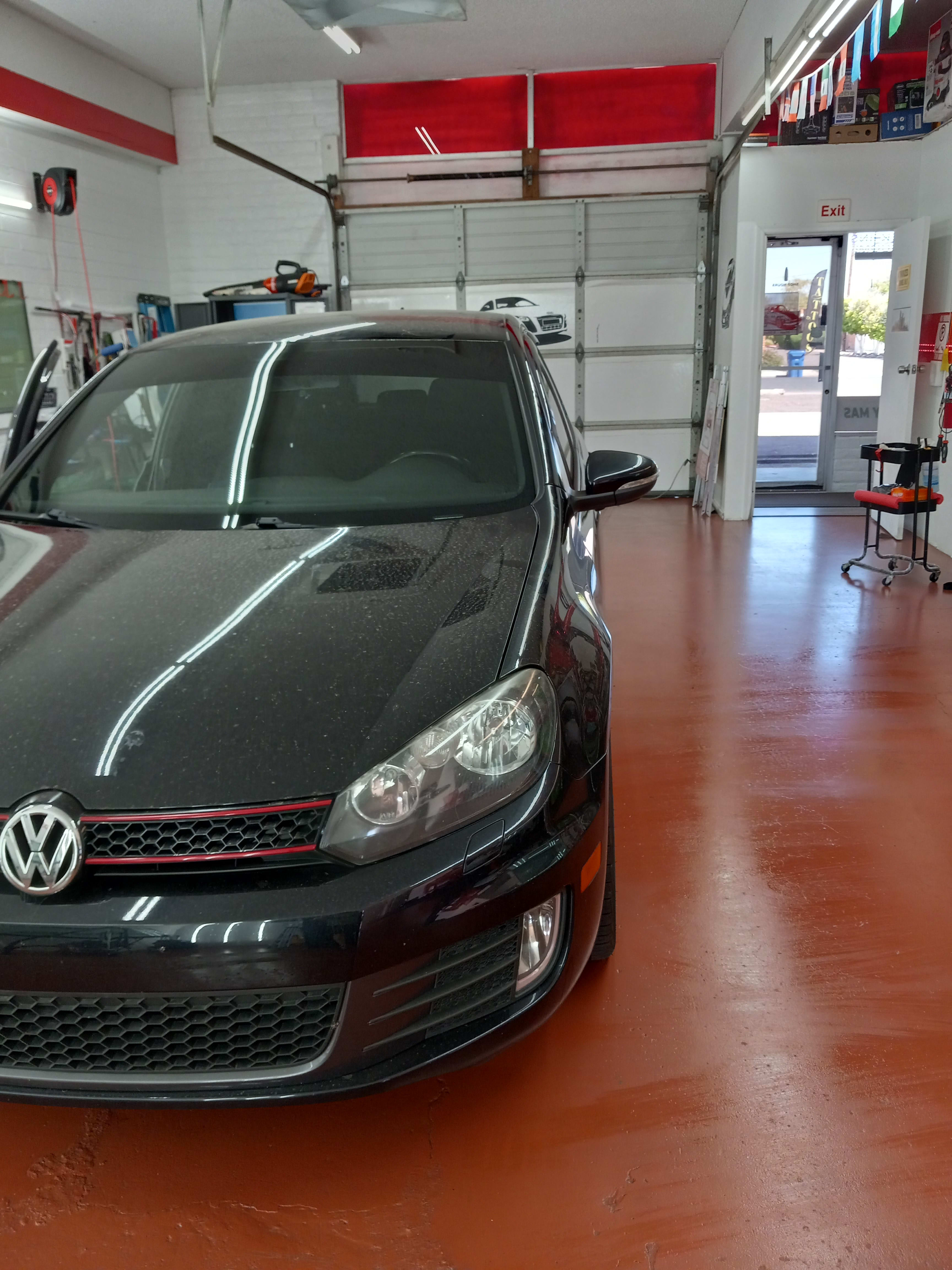 Black VW Golf GTI, front