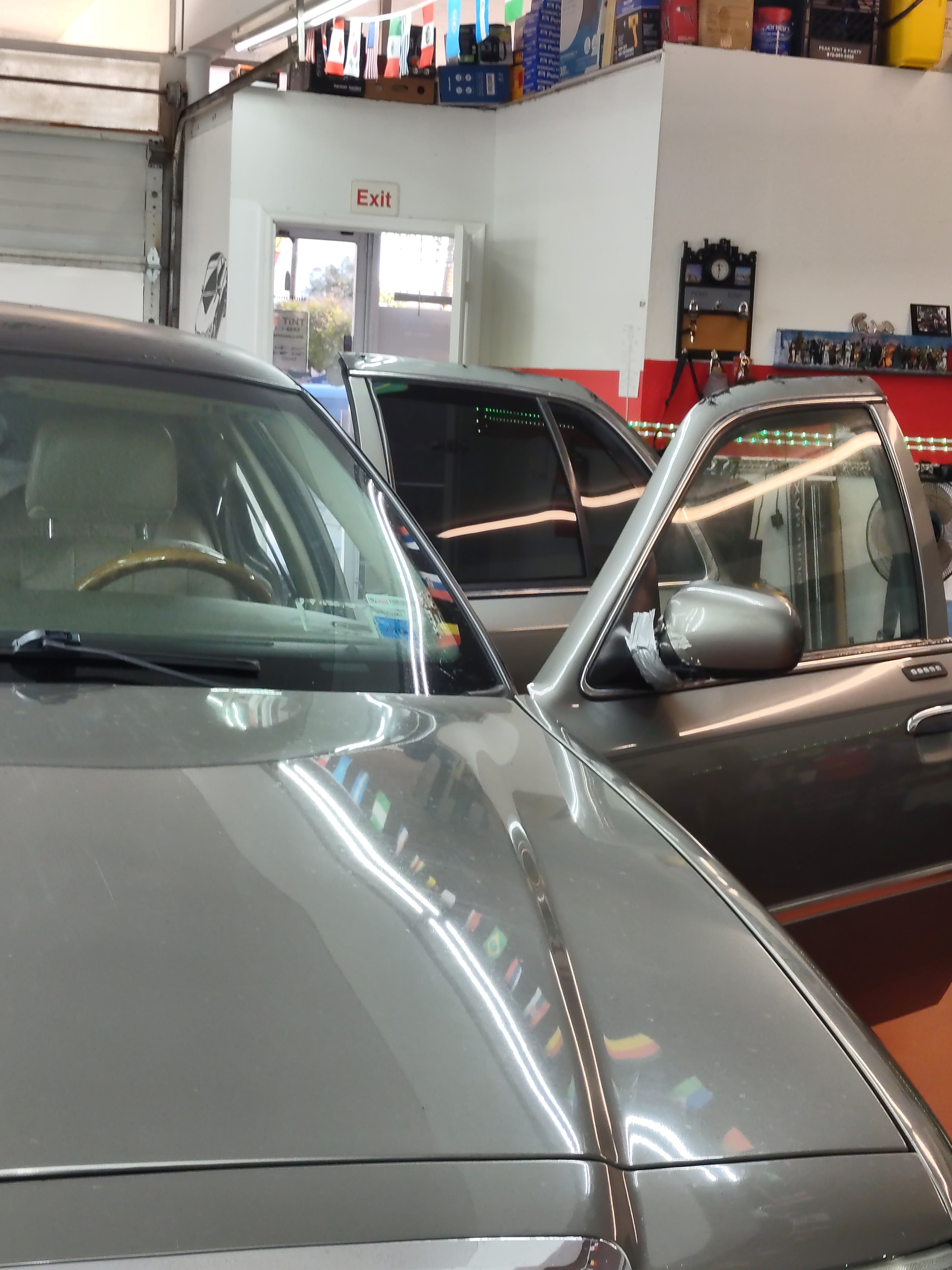 Grey Honda Accord, front with door open